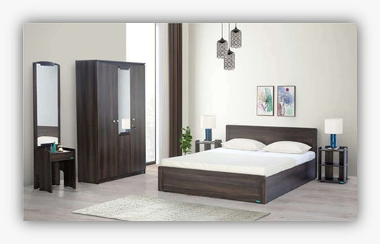 Premium 4βpiece bedroom set featuring a stylish bed ( 5' x 6' ) with 2 Side tables, 1 wardrobe ( 4' x 7' ) ,1 Dressing table with mirror ( 2.5' x 7' ). Crafted from highβquality wood by kleve World