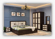 Premium 4‑piece bedroom set featuring a stylish bed ( 5' x 6' ) with 2 Side tables, 1 wardrobe ( 4' x 7' ) ,1 Dressing table with mirror ( 2.5' x 7' ). Crafted from high‑quality wood  by kleve World